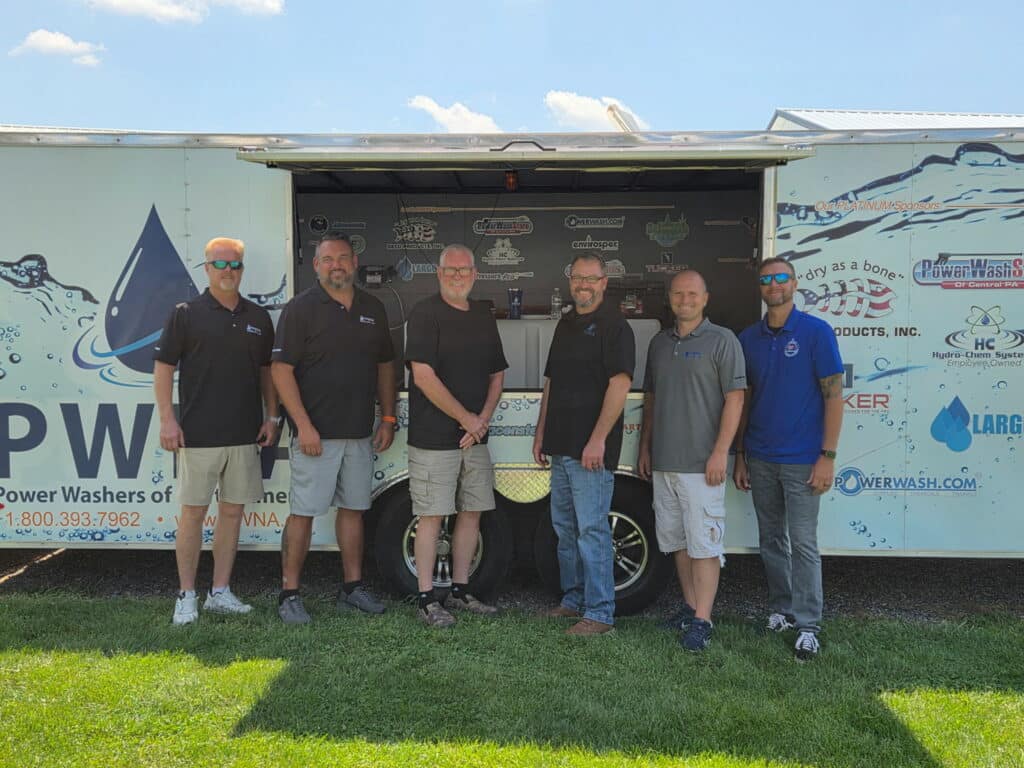 Mike Dingler and PWNA board members at the 1st Annual PWNA Education Summit in front of the training trailer